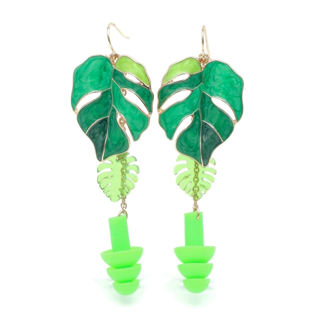 Green leaf Monstera Earplug Earrings with ear plugs attached as rave jewelry. Zoomed in view.