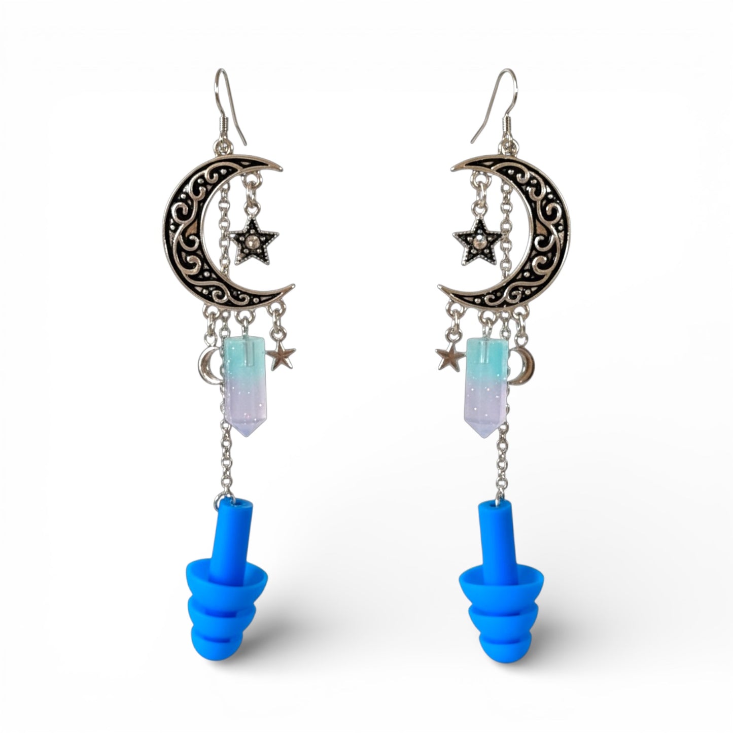 Moon shaped earrings with crystals and blue ear plugs 